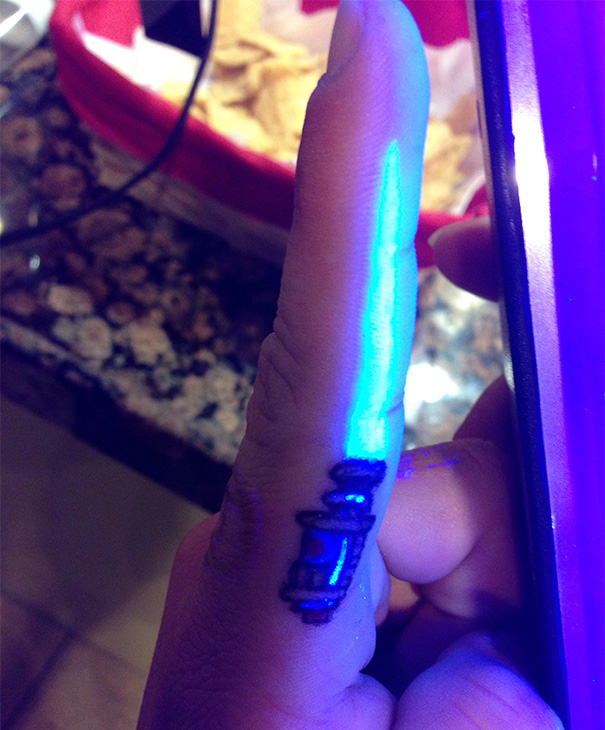 Glow In The Dark Lightsaber Finger Tattoo