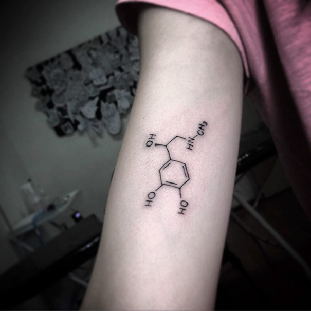 Chemistry tattoo on arm