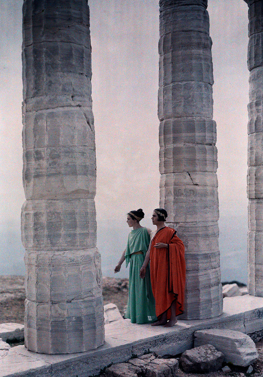 Two Dancers In Costume Stand Between The Columns Of Poseidon’s Temple, Greece, 1930