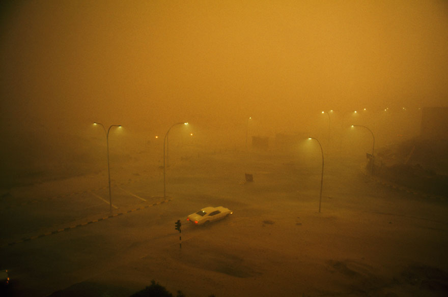A Combination Sand And Rain Storm Batters A Lone Automobile In Kuwait, May 1969