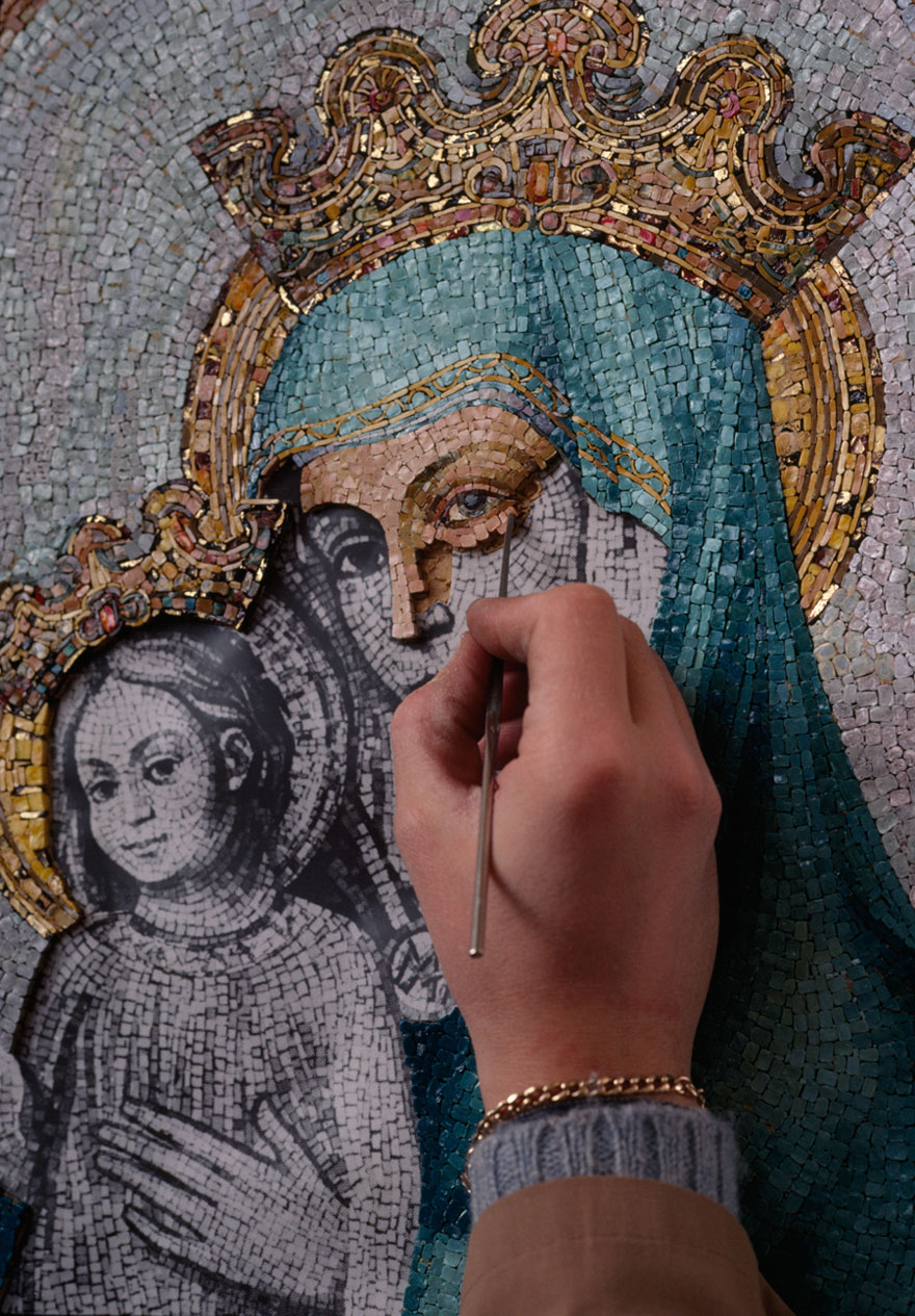 A Woman Working On A Mosaic Of Mary And Baby Jesus In Vatican City
