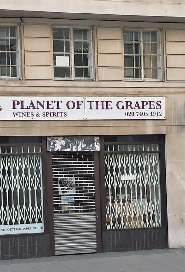 Wines and spirits shop sign ‘PLANET OF THE GRAPES’