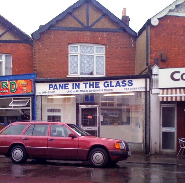 Windows and doors shop sign ‘PANE IN THE GLASS’