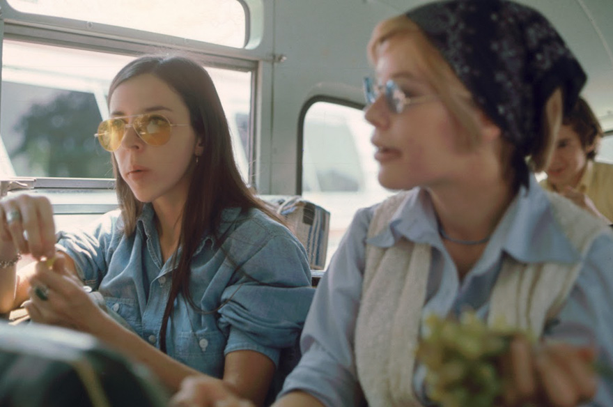 A Pair Of Women Eat Grapes On The Bus To Yasgur's Farm, On Their Way To Attend The Woodstock Music And Arts Fair