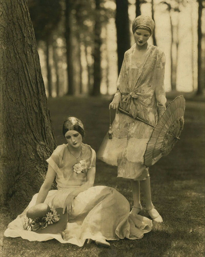 American Models Marion Morehouse and Helen Lyons wearing masks