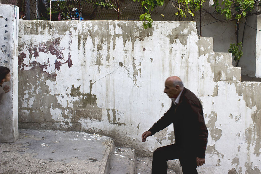 Peeling Off Old Paint To Tell Stories Of Palestinian Refugees