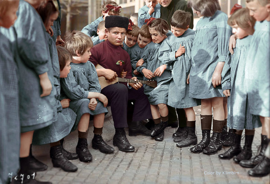 A Man With A Group Of Russian Children, 1940