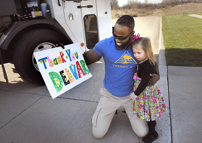 Little Girl Surprises Her Favorite Garbage Man With Birthday Cupcake