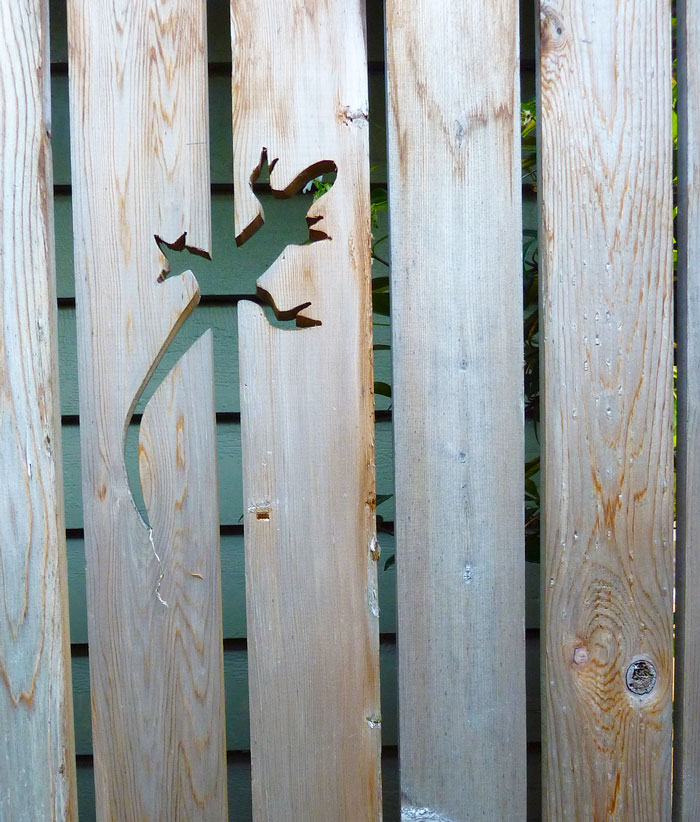 Gecko Carved On A Fence