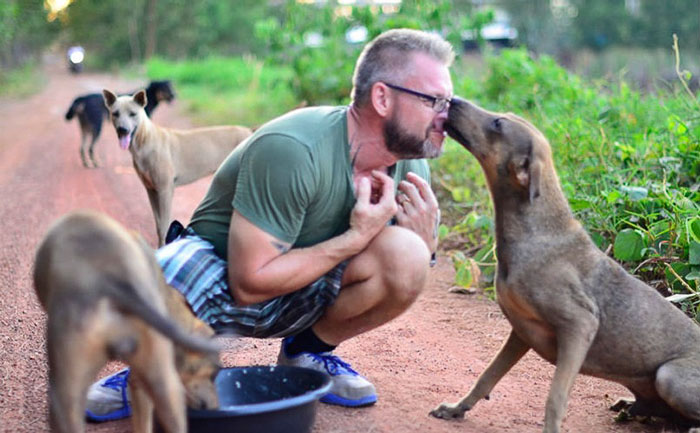 This Man Feeds 80 Stray Dogs Every Day Because He Can't Bear to See Them Starve