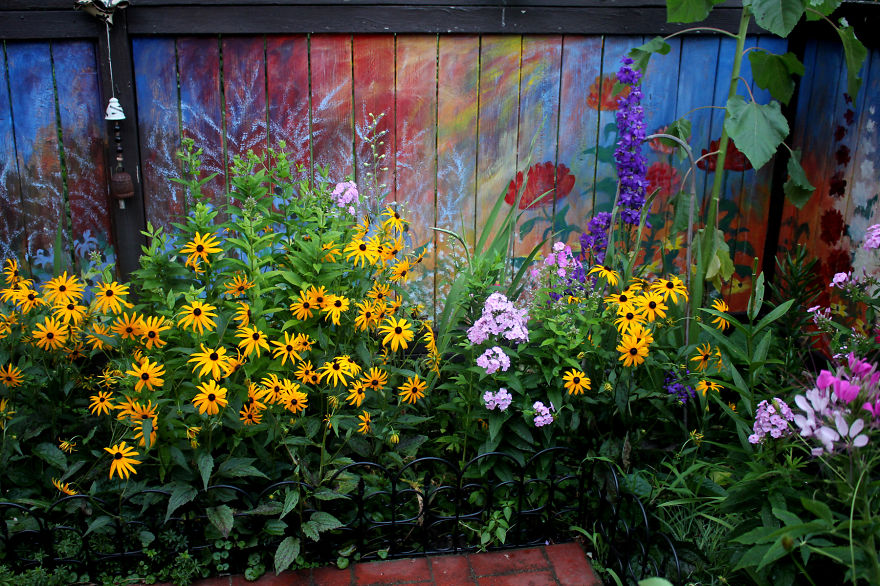 I Revived Our Old Garden Fence By Painting Vivid Flowers On It