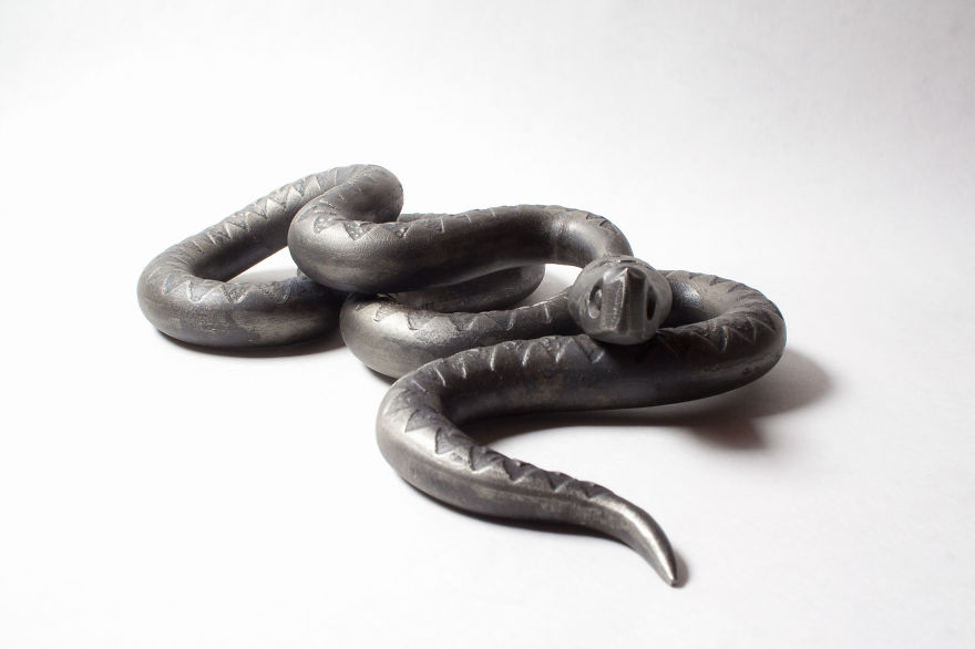 Artist Creates Wrought Iron Snake Sculptures With Etching