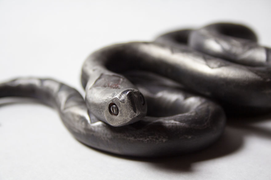 Artist Creates Wrought Iron Snake Sculptures With Etching