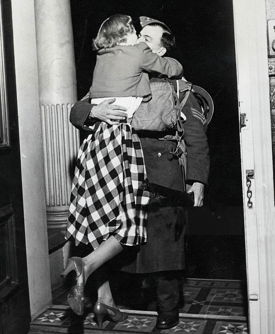 Soldier Is Greeted With A Kiss From His Ecstatic Wife As He Comes Home From France On Christmas