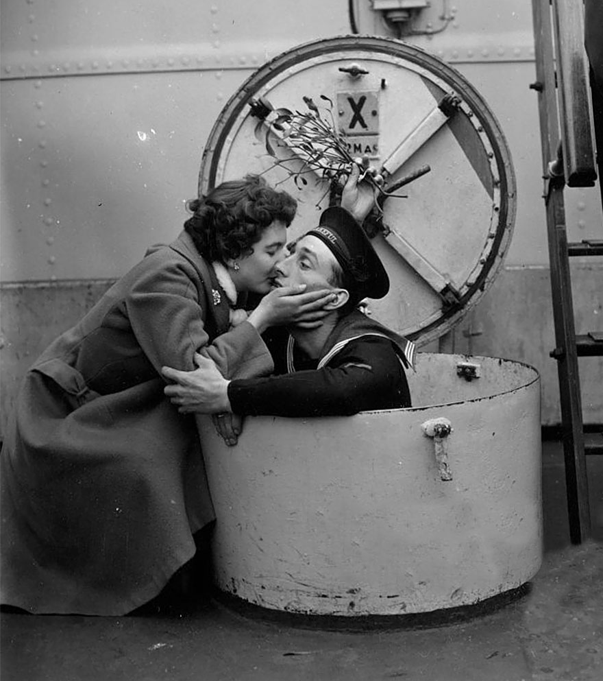 D. Brown Kissing Her Fiance Terry Under The Mistletoe, On Board The HMS Wakeful At Portsmout, 1955