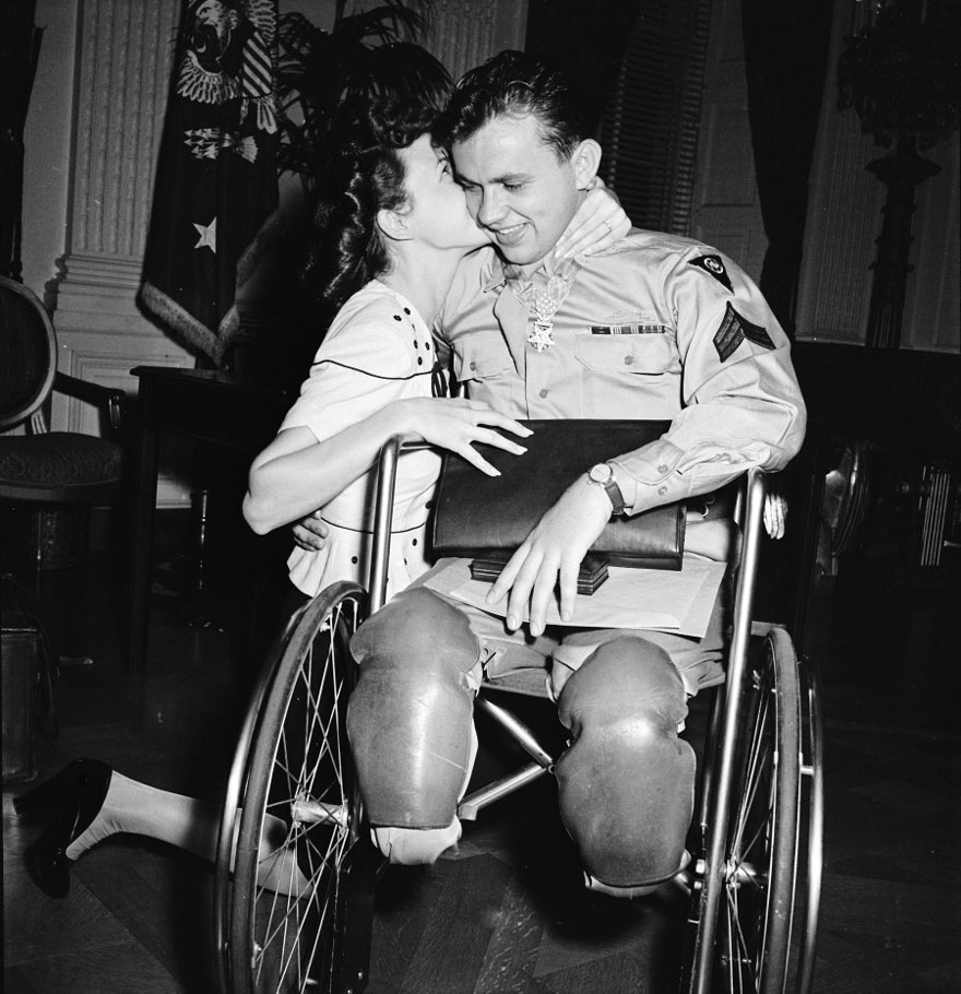Jean Moore Kneels And Kisses Her Fiancé, Wheelchair-Bound World War II Veteran Ralph Neppel, 1945