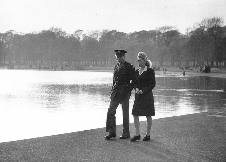 A U.S. Officer And His Girl Walk By The Serpentine In Hyde Park, London, 1945