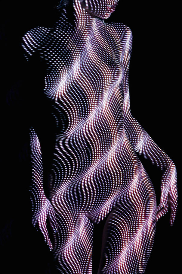 Photographer Dresses Nude Women In Light And Shadows (NSFW)