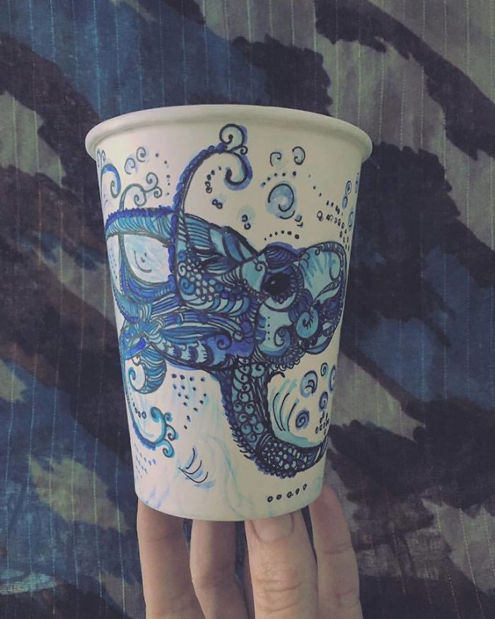 My Friend Paints On Paper Cups Using Coffee