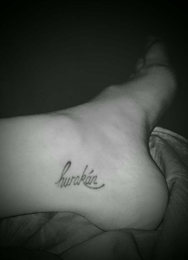 single word ankle tattoo