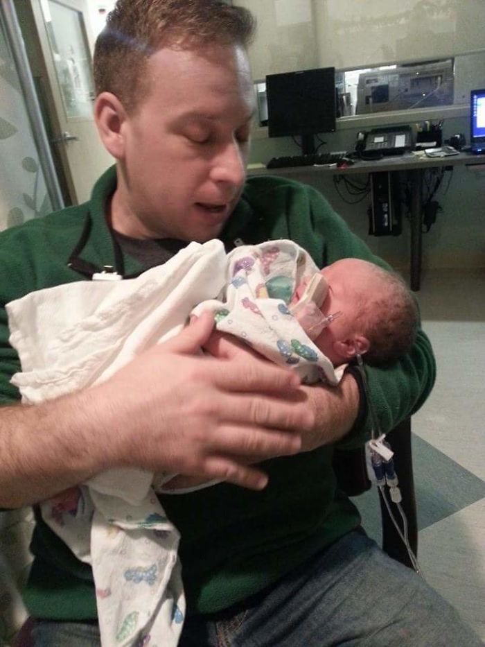 Hubby Holding His Miracle Nicu Baby For The First Time.