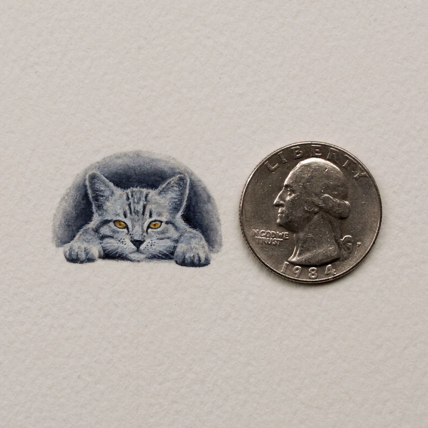 Tabby. A Tabby Cat With A Twist - It Can Fit Under A Quarter!