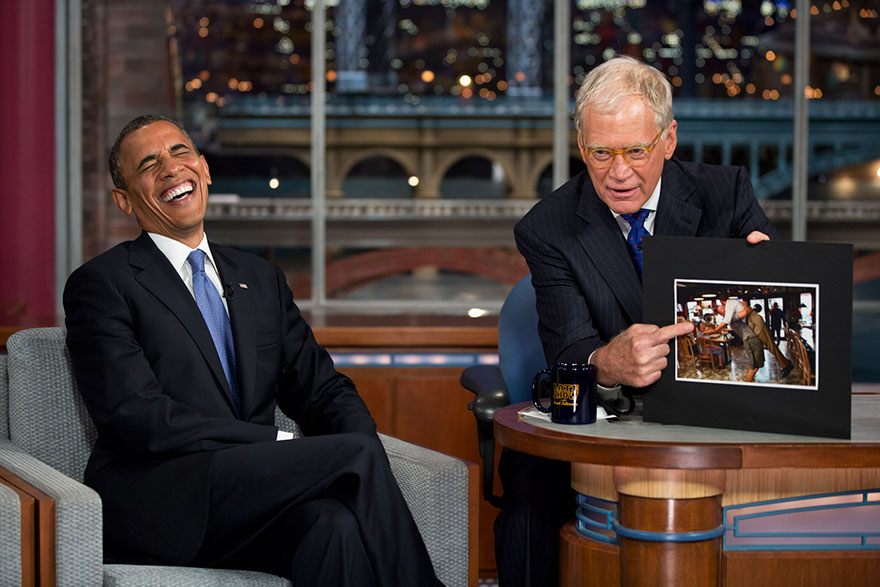 President Barack Obama Reacts To A Photograph During An Interview With David Letterman