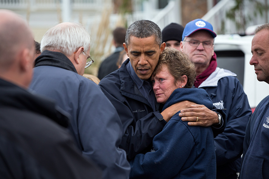 President Barack Obama Hugs Donna Vanzant, The Owner Of North Point Marina, As He Tours Damage From Hurricane Sandy In Brigantine, N.J.