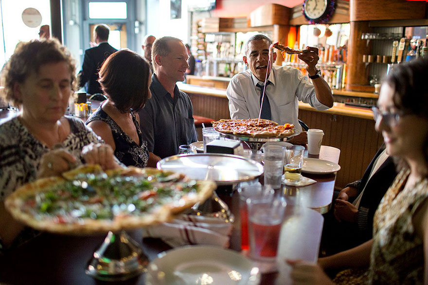 President Barack Obama Shares A Pizza Dinner With Individuals Who Wrote Letters To Him, At The Wazee Supper Club In Denver, Colo