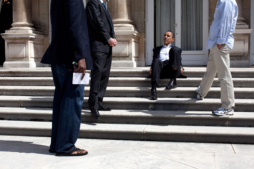 President Barack Obama Talks With Aides Outside The U.S. Ambassador's Residence In Paris Before Returning To Washington