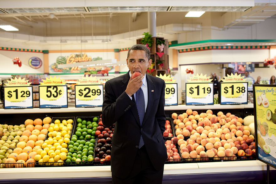 President Barack Obama Eats A Peach Following A Town Hall Meeting At Kroger's Supermarket