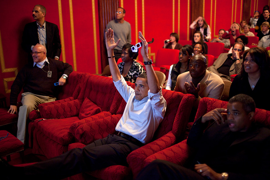 President Barack Obama Holds 3-D Glasses While Watching The Super Bowl Game At A Super Bowl Party