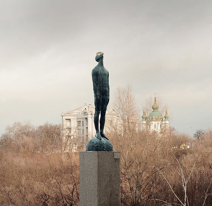 Sculpture Of Giant Raindrop Resting On Man's Face In Ukraine
