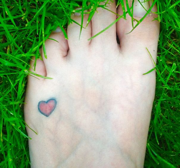 colorful heart foot tattoo
