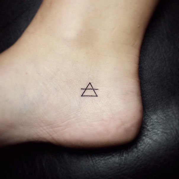 Tiny Foot Tattoo