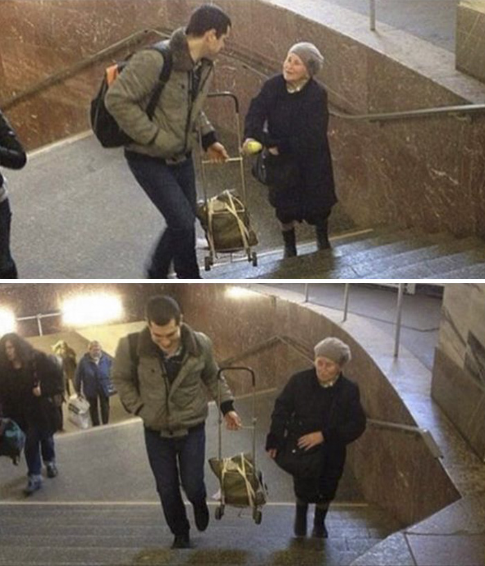 A Guy Casually Helping A Woman With Her Luggage