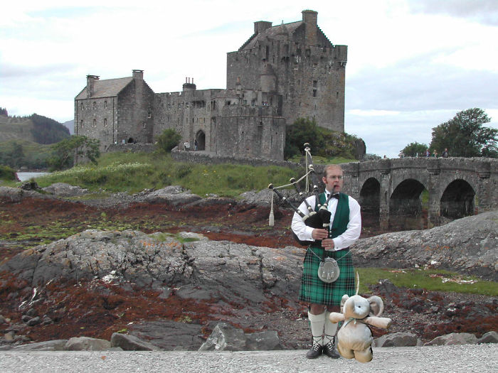 With Piper At Eilean Donan Castle, Scotland