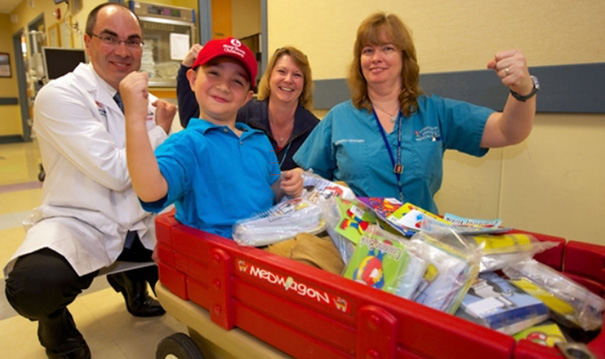 After His Treatment And Recovery Rrom The Stomach Flu, Six-Year-Old Jake And His Family Brewed Iced Tea And Baked Cookies, Which They Sold At His Father’s Business Asking For Donations Only. They Raised $275, Which Jake Used To Purchase 1,800 Coloring Books To Give To Other Children Who Are Treated At The Hospital