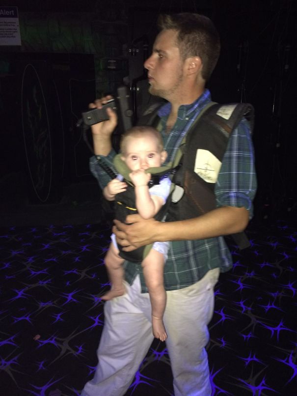 Daddy Teaching His Son How To Be A Laser Tag Champ