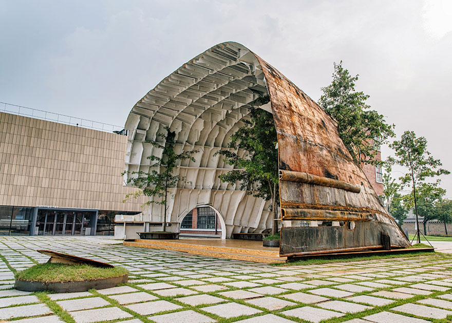 Old Rusty Ship Turned Into Stunning Building With Trees And Plants