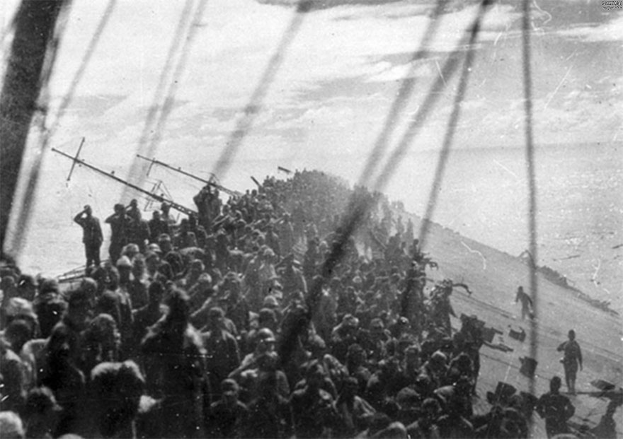 Crew Of The Japanese Carrier Zuikaku Give One Final Banzai Cheer Before The Ship Sinks, 1944