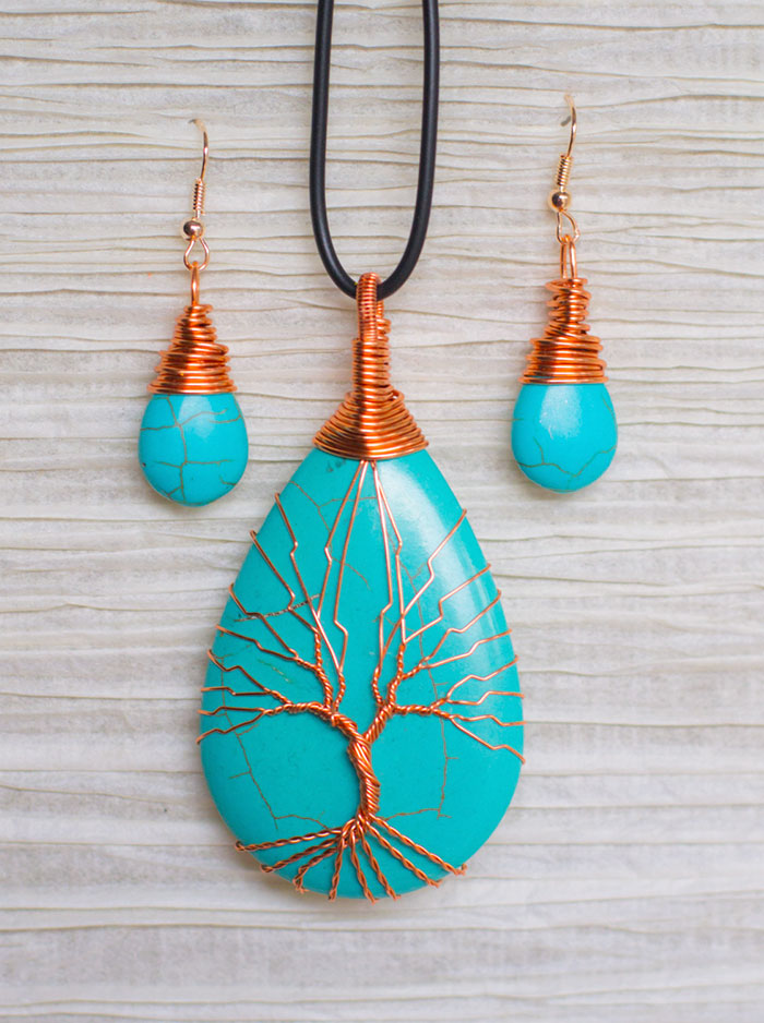 Wife & Husband Turn Wire Found In Discarded TVs Into Tree Of Life Pendants