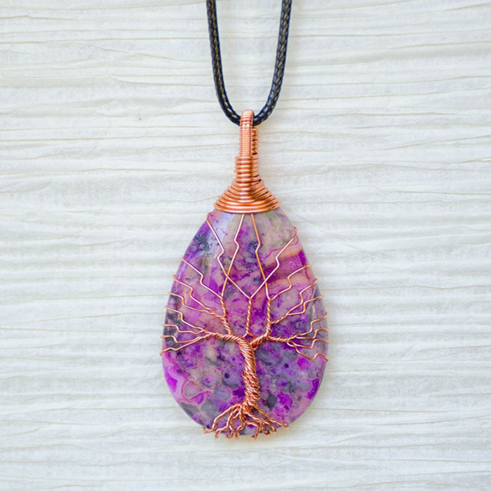 Wife & Husband Turn Wire Found In Discarded TVs Into Tree Of Life Pendants