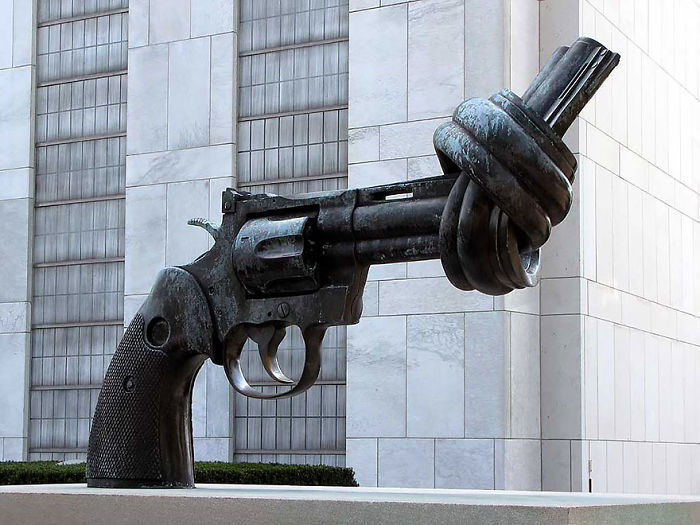 Bronze sculpture of a revolver with its barrel tied in a knot, one of the most amazing sculptures in the world.