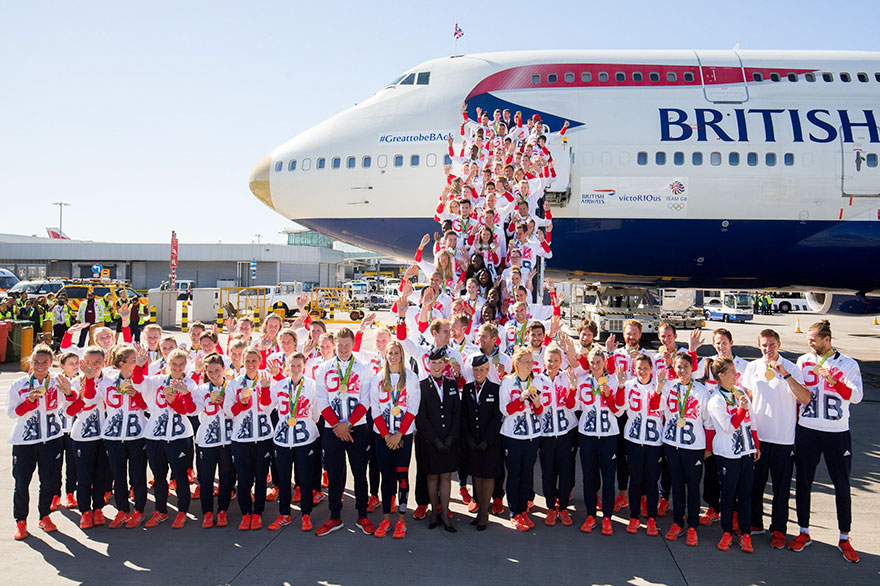 british-olympic-athletes-red-bags-heathrow-airport-2