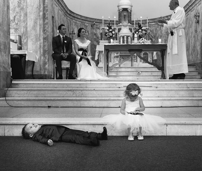 Ring Bearer Just Can't Take It Anymore While Flower Girl Is Too Busy To Care