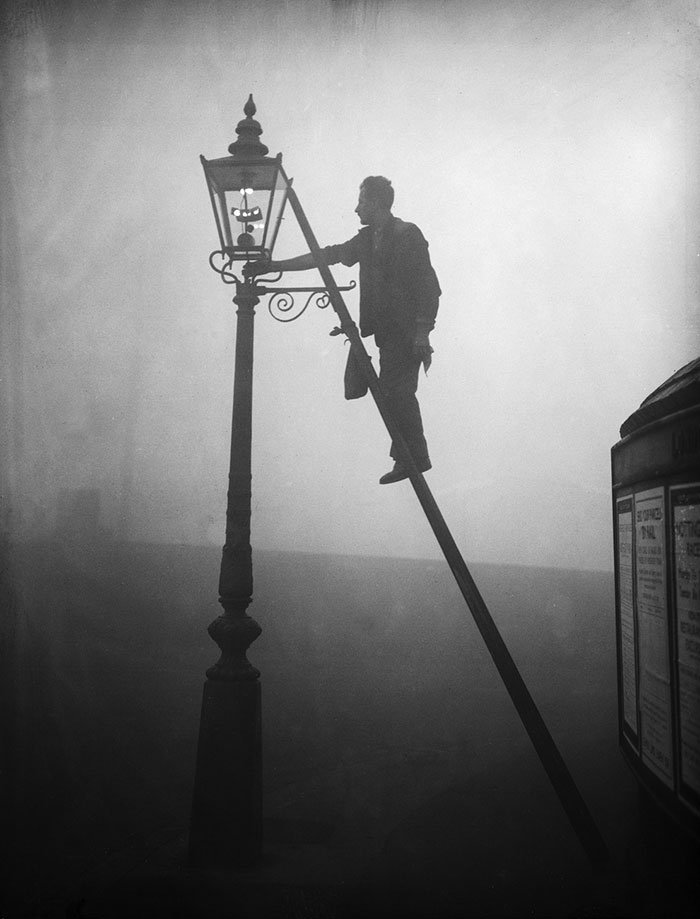 A Lamp Lighter At Work In Finsbury Park, London, 17 October 1935