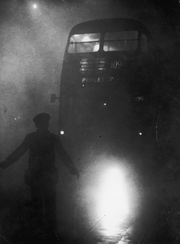 A Bus Conductor Walks In Front Of His Vehicle, 9 December 1952