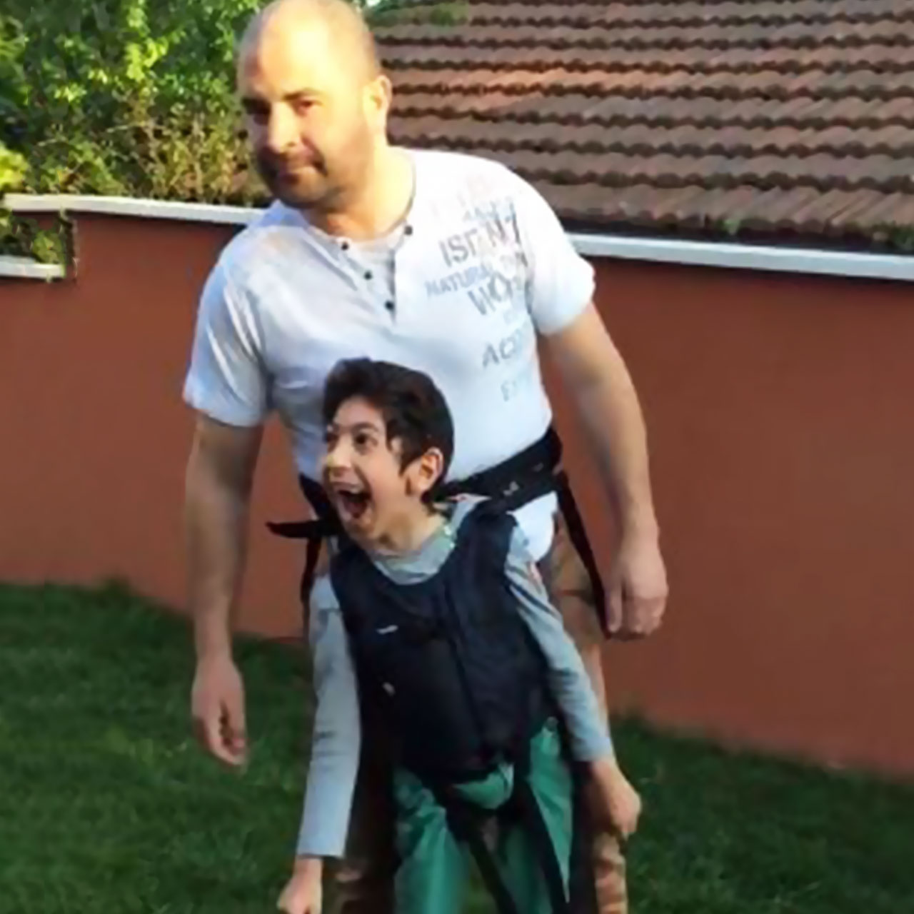 Father Takes His Paralyzed Son For A Walk And The Boy's Reaction Says It All
