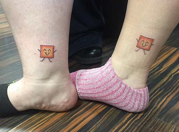 Two cheez-its leg tattoos 